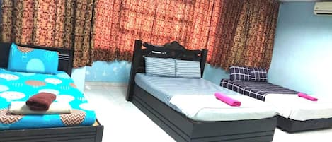 Habitación triple Deluxe | Wifi gratis y ropa de cama