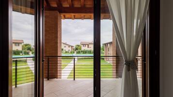 Apartment, 2 Bedrooms | Premium bedding, down comforters, cribs/infant beds, free WiFi