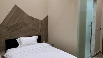 In-room safe, laptop workspace, blackout curtains, soundproofing