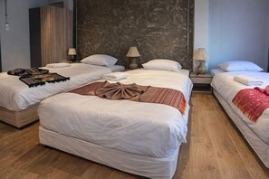 Deluxe Triple Room, City View | Desk, laptop workspace, free WiFi, bed sheets