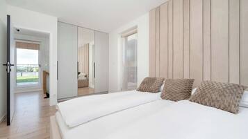 2 habitaciones, tabla de planchar con plancha, cuna de viaje y wifi