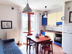Apartment, 2 Bedrooms, Balcony, City View | Dining room - Bright Apartment With Pool (Cavallino-Treporti)