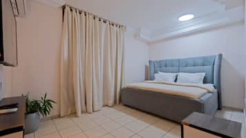 Deluxe Apartment, Balcony, City View | Blackout curtains, iron/ironing board, free WiFi