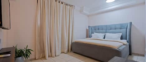 Deluxe Apartment, Balcony, City View | Blackout drapes, iron/ironing board, free WiFi