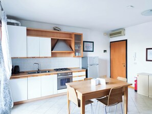 Apartment, 2 Bedrooms, Patio, Garden View | Interior - Comfortable Flat With Patio and Pool (Cavallino-Treporti)