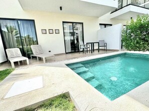 Outdoor pool - 2-bedroom apartment in Downtown Punta Cana with private pool , AC and gym access (Punta Cana)
