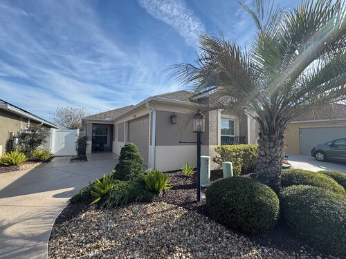 Three Bedroom!  Enclosed and private lanai.Super close golf & rec centers.