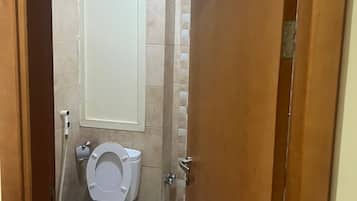 Economy Double Room, City View | Bathroom | Separate tub and shower, free toiletries, towels, soap