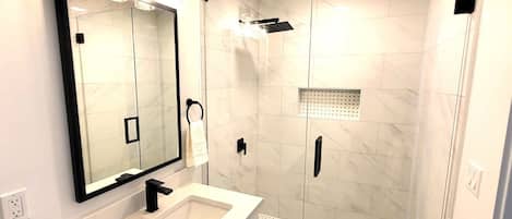 Shower, hair dryer, towels