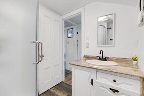 Shower, towels, soap, toilet paper
