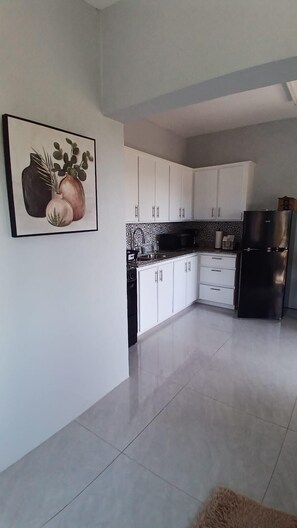 Comfort eenpersoonskamer, uitzicht op zee | Privékeuken