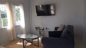 Doppia Comfort, vista mare parziale | Area soggiorno