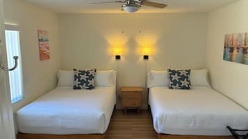 Laptop workspace, iron/ironing board, cots/infant beds, bed sheets