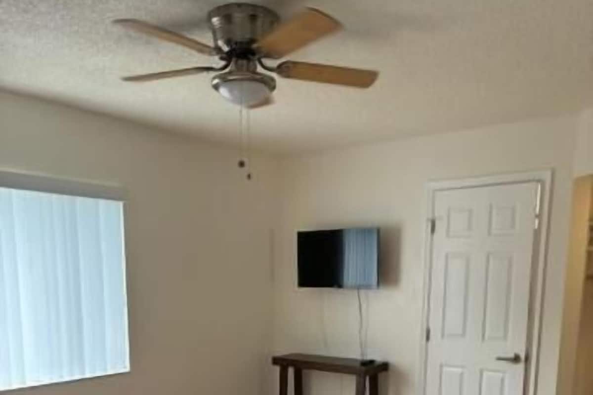 Suite | Laptop workspace, iron/ironing board, bed sheets