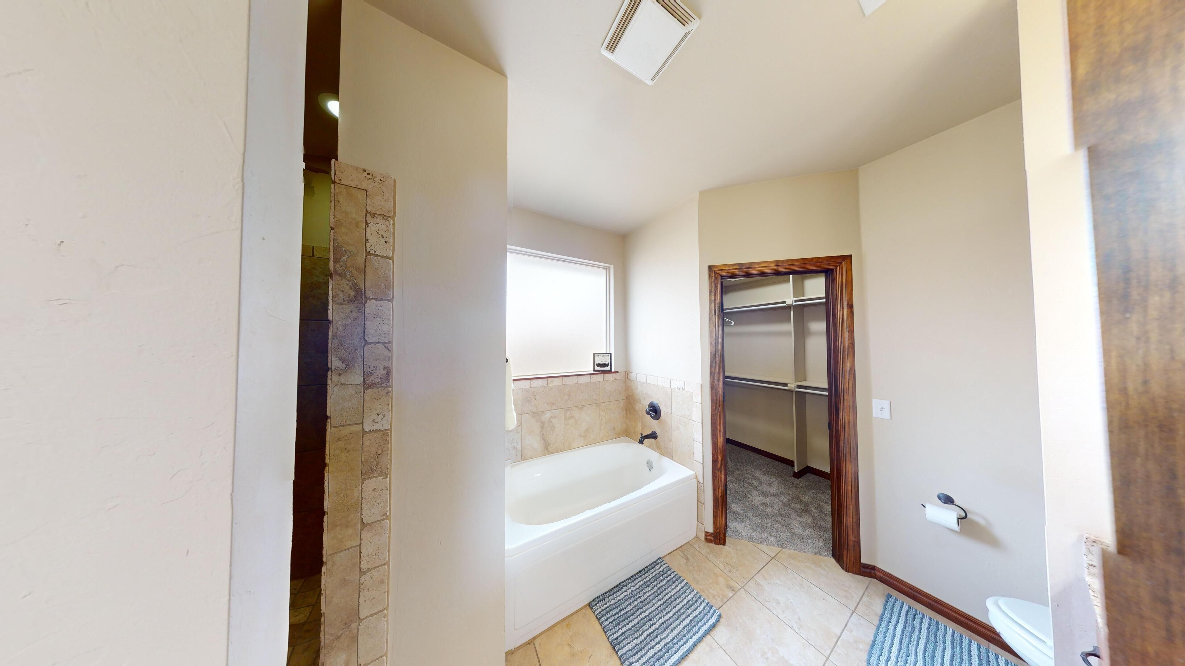 Jetted bath, hair dryer, towels, soap