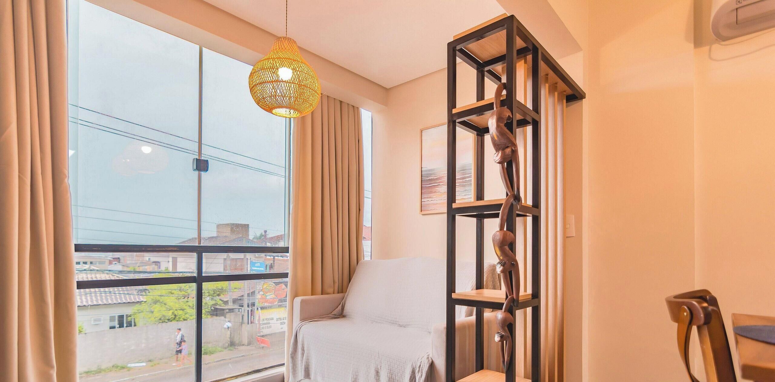 Deluxe Apartment, Pool Access, Beach View | Living area | 55-inch Smart TV with digital channels, Netflix, streaming services