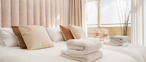 2 habitaciones, tabla de planchar con plancha, wifi y ropa de cama