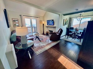 TV, fireplace, books, music library - Ski In/Out Suite with a Loft, Pool, Gym (Sugar Mountain)