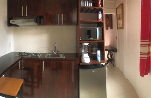 Fridge, microwave, coffee/tea maker, cookware/dishes/utensils