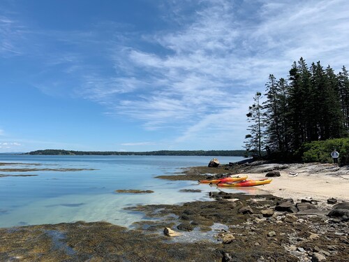 Serene 3-bed cottage in the Midcoast Maine woods, perfect for a quiet getaway.