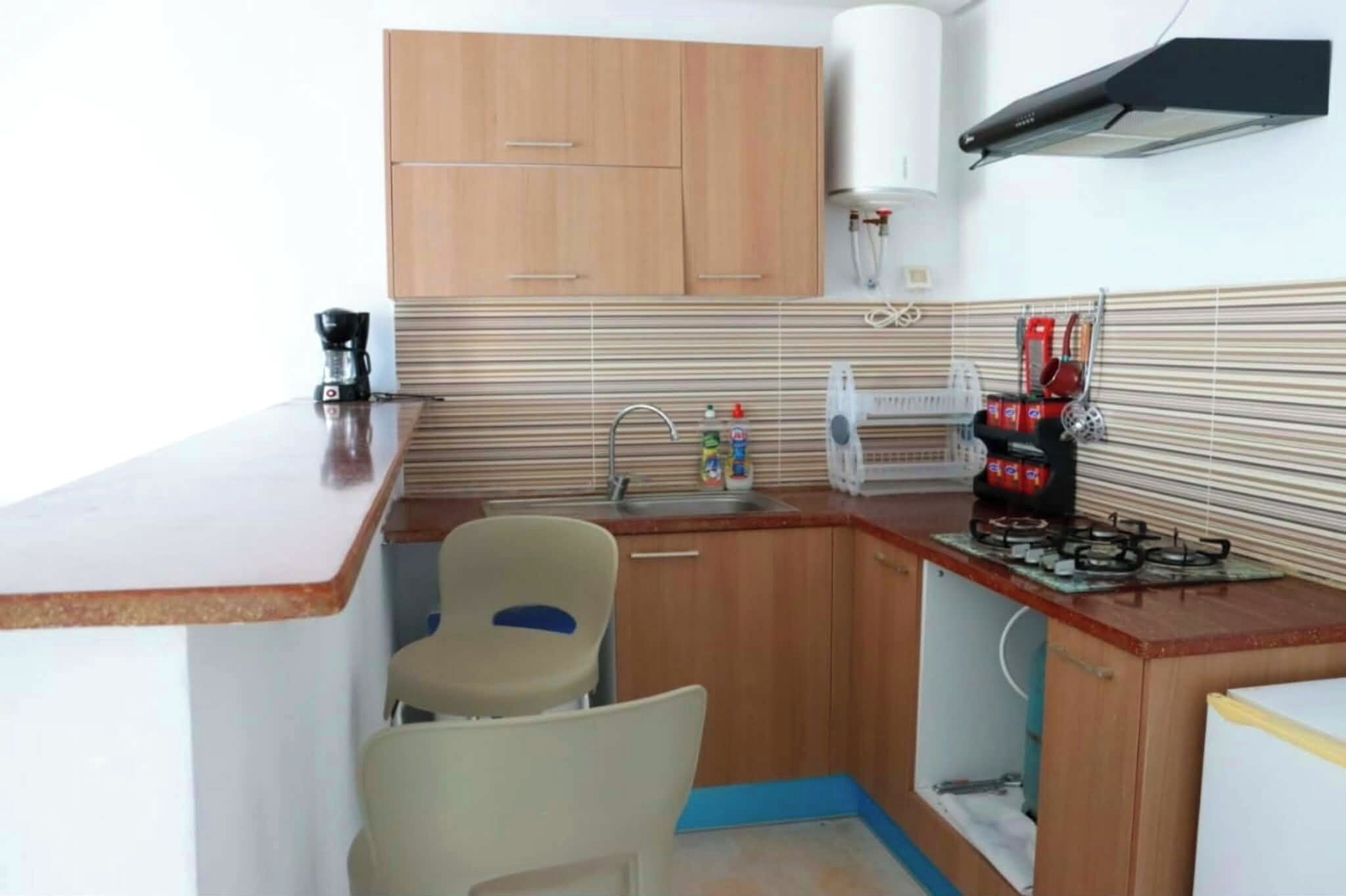 Fridge, stovetop, coffee/tea maker, electric kettle