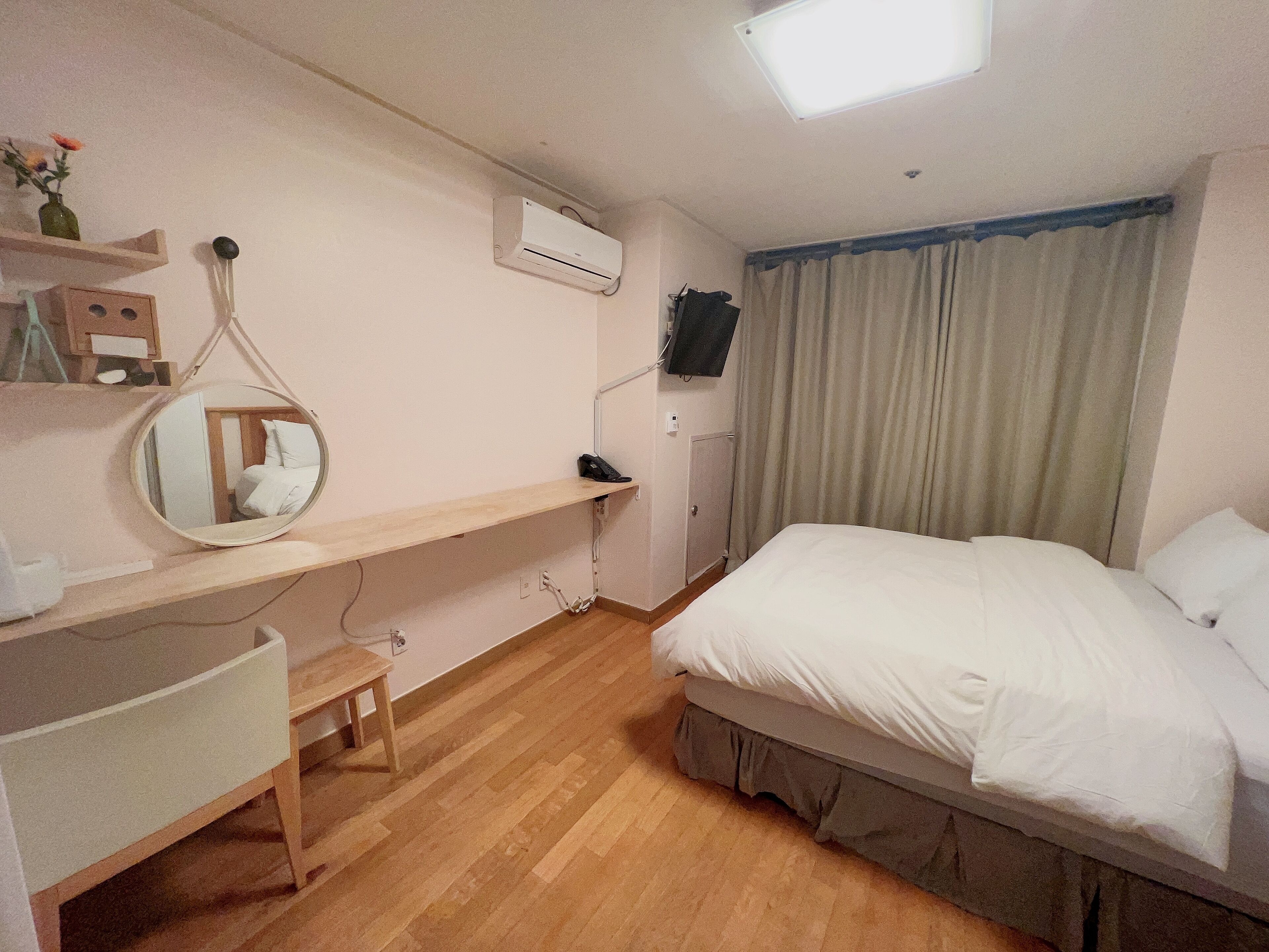 Economy Double Room, City View | In-room safe, blackout drapes, soundproofing, iron/ironing board