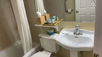 Hair dryer, towels, soap, shampoo