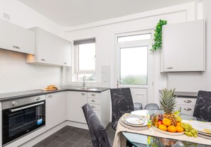 Fridge, microwave, oven, dishwasher - Modern 2 bedroom apartment close to local amenities. (Airdrie)
