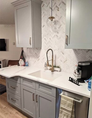 Chic ski-in ski-out slopeside 1 bedroom condo at Holiday Valley resort sleeps 4.
