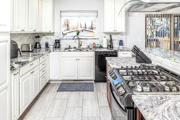 Fridge, microwave, oven, stovetop - Meridian Suite at North Star Lodge • HotTub • View (Anchorage)