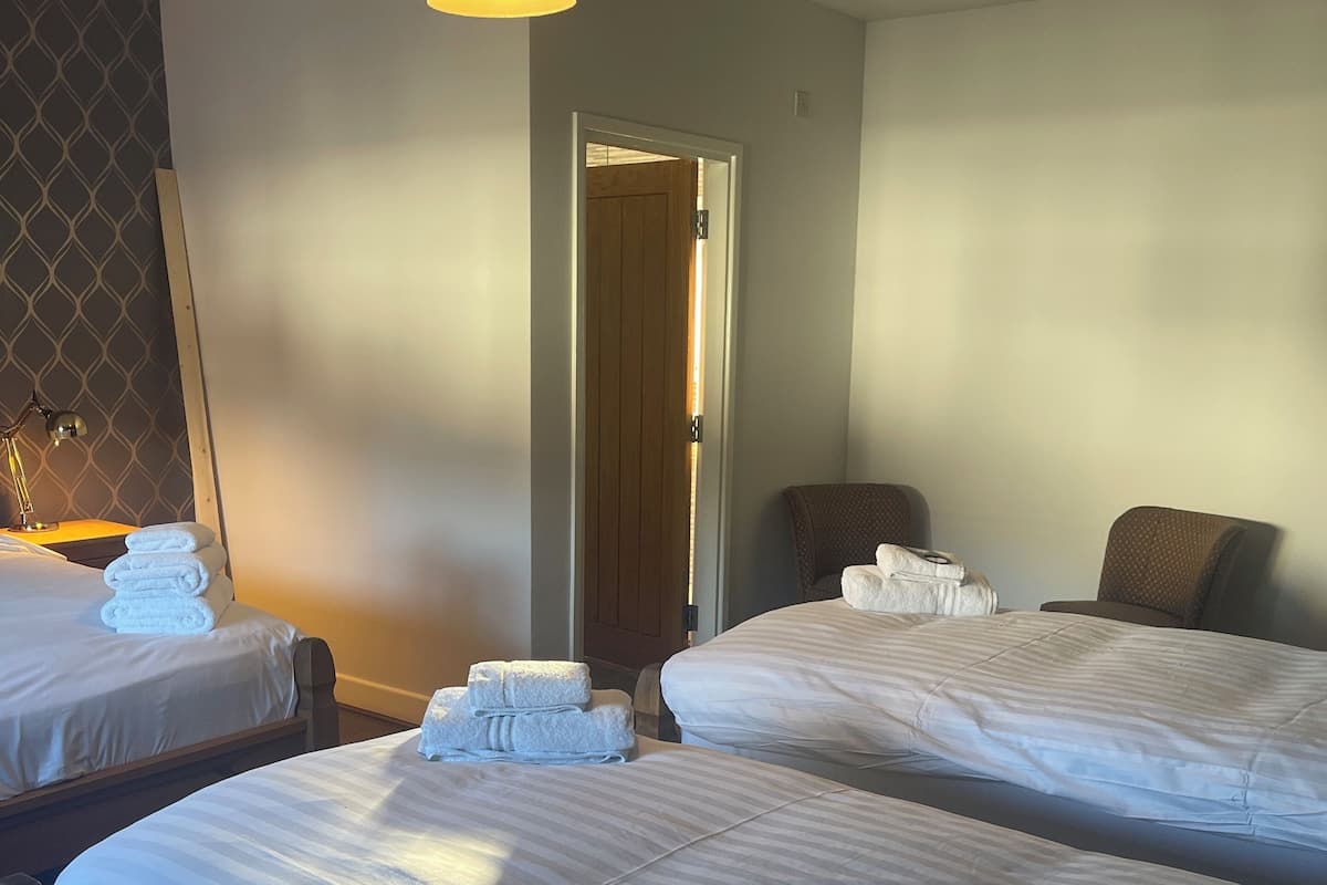 Deluxe Quadruple Room, Courtyard View