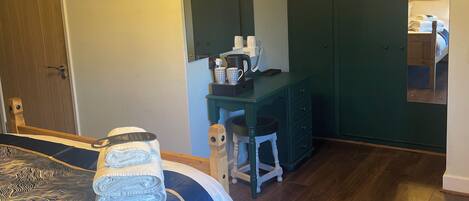 Deluxe Double Room, Courtyard View | Desk, laptop workspace, blackout curtains, iron/ironing board