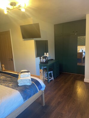 Deluxe Double Room, Courtyard View | Desk, blackout drapes, iron/ironing board, free WiFi