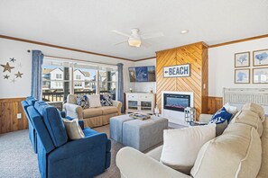TV, fireplace - BAEcation | 200 ft to the beach | Community Pool (Southern Shores)