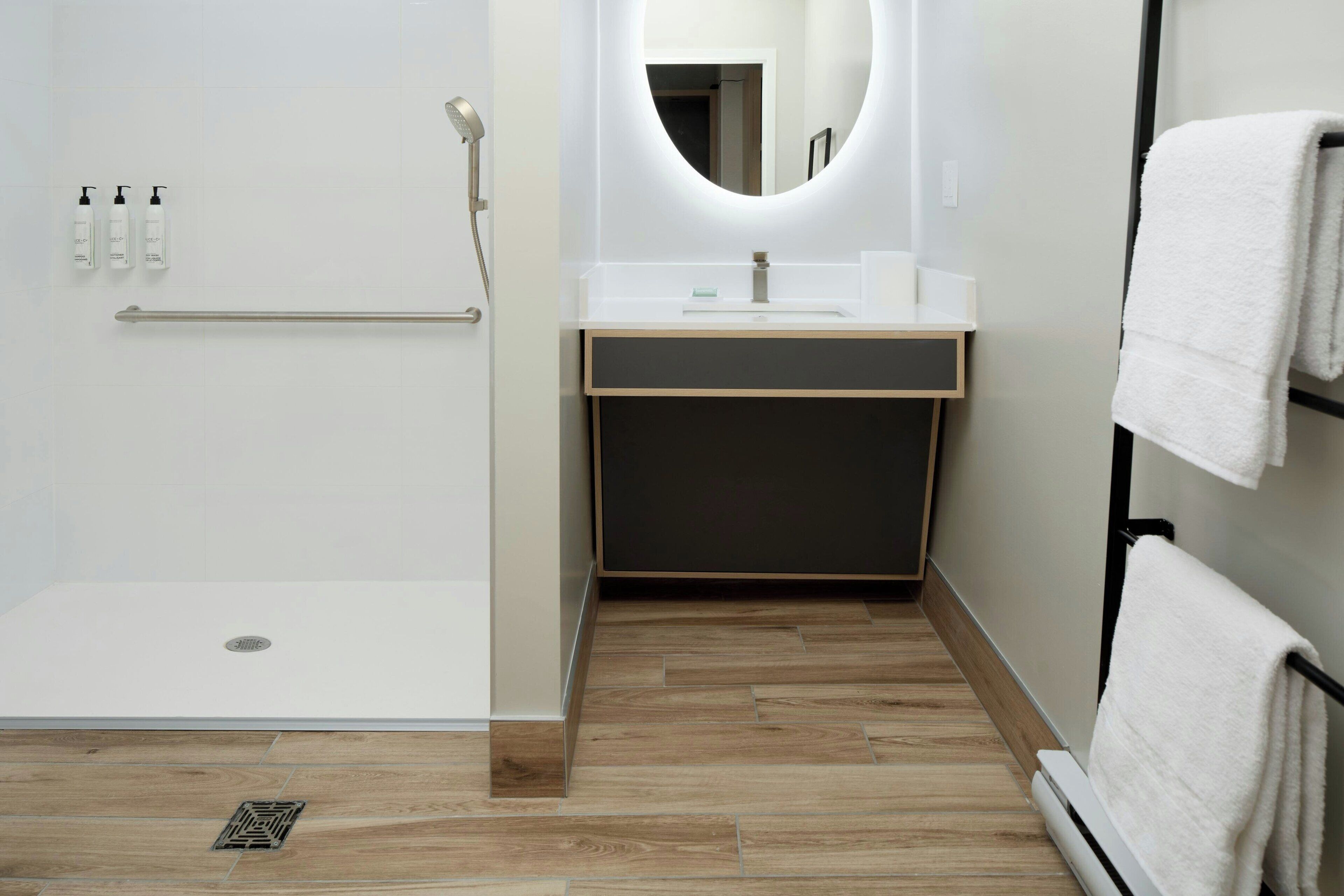Shower, eco-friendly toiletries, hair dryer, towels
