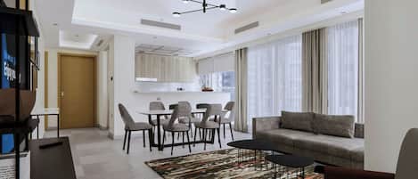 LÀgenhet Deluxe - 2 sovrum | VÀrdeförvaringsskÄp pÄ rummet, skrivbord och arbetsyta för laptop