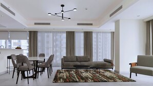 Apartment, 2 Bedrooms | Living room | 65-inch LED TV with satellite channels - Marriott Executive Apartments Jumeirah Lakes Towers, Dubai (Dubai)