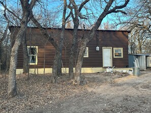 Exterior -  1-bedroom cabin on wooded acreage 30 min from winstar (Overbrook)