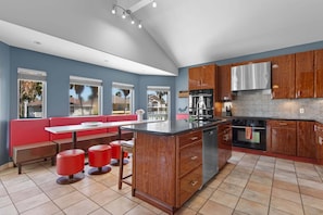 Fridge, coffee/tea maker, toaster, dining tables - 217 Spacious 4BR, 3BA home on South Padre Island, perfect for family getaways! (South Padre Island)