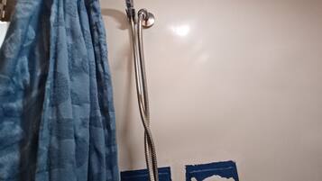 Shower, towels, soap, toilet paper