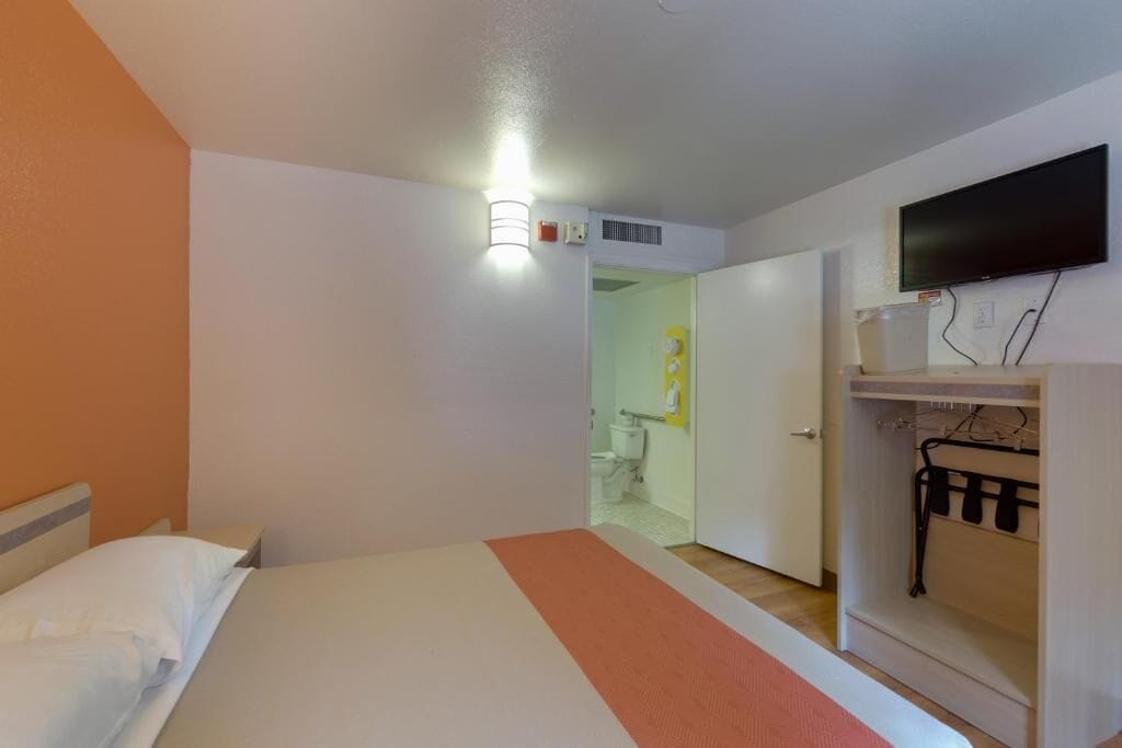 Standard Room, 1 Queen Bed, Roll-in Shower | Laptop workspace, iron/ironing board, free WiFi