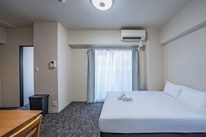 Kahden hengen standard-huone, parveke | Ilmainen Wi-Fi, vuodevaatteet