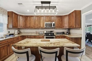 Fridge, microwave, oven, stovetop - Spacious Lakefront Home w/ Private Dock, Decks, Game Room & Firepit at the 12mm (Sunrise Beach)