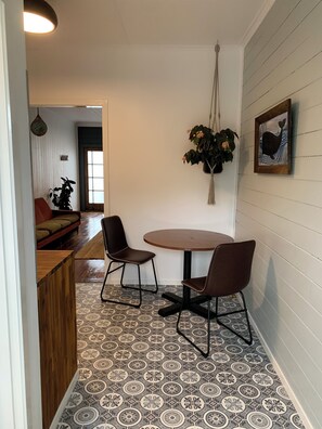 Interior - The Old Siren.
An old shop by sea, for walkers, surfers, and slow mornings. (Ōpunake)