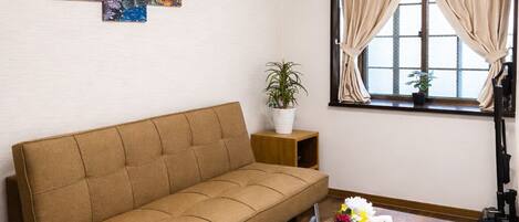 Deluxe House, Balcony | Living area