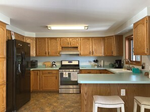 Fridge, microwave, oven, stovetop - Home on Lake Huron with sandy beach and beautiful yards in Cheboygan, Michigan  (Cheboygan)