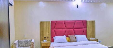 Deluxe Room, Balcony, City View | Desk, laptop workspace, blackout drapes, soundproofing