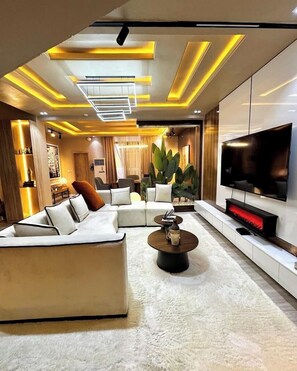 Economy Apartment, Balcony, City View | Living area - Casa De King  (Abuja)