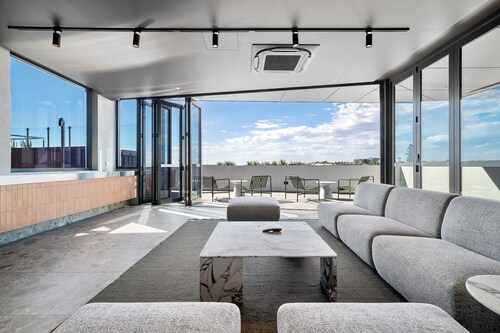 Coastal Apartment with Rooftop Pool