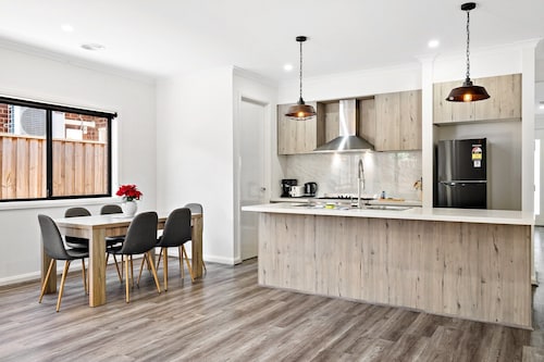 Spacious 4-Bed Home with Private Outdoor Area